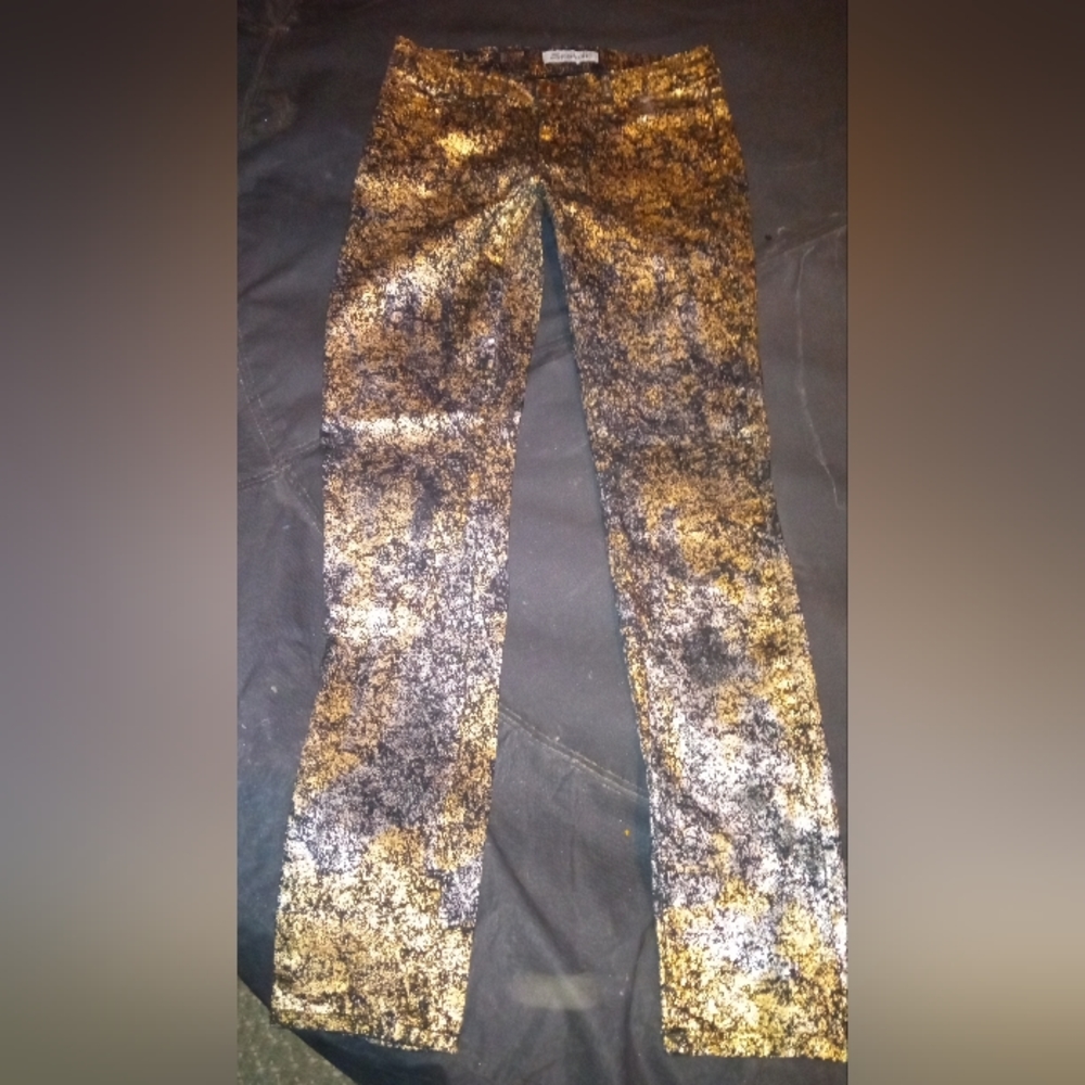 Gold and silver embossed Emperial Jeans.